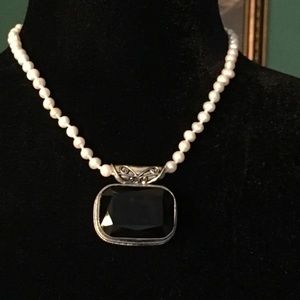 Sterling silver black spinel pendant and fresh water pearl necklace.
